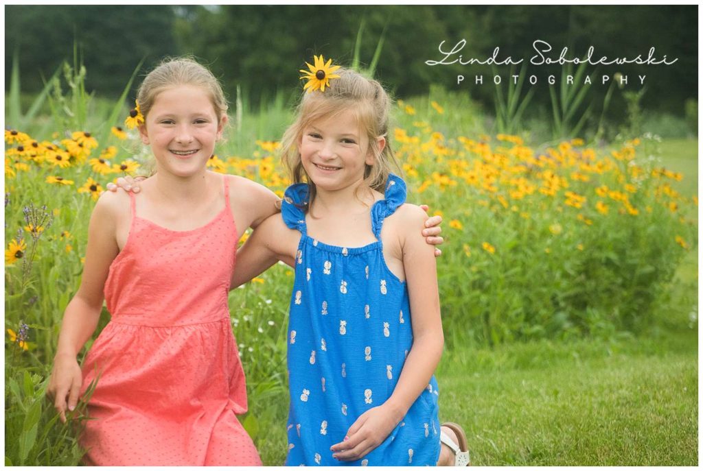 two sisters in summer dresses