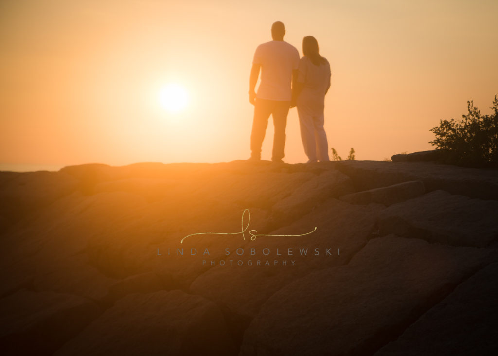 silhouette of couple on the beach, madison ct photographer