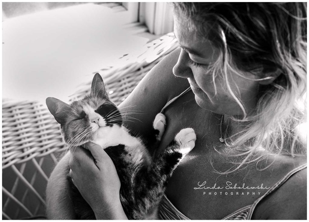 girl holding a smiling cat, westbrook ct photographer, personal project