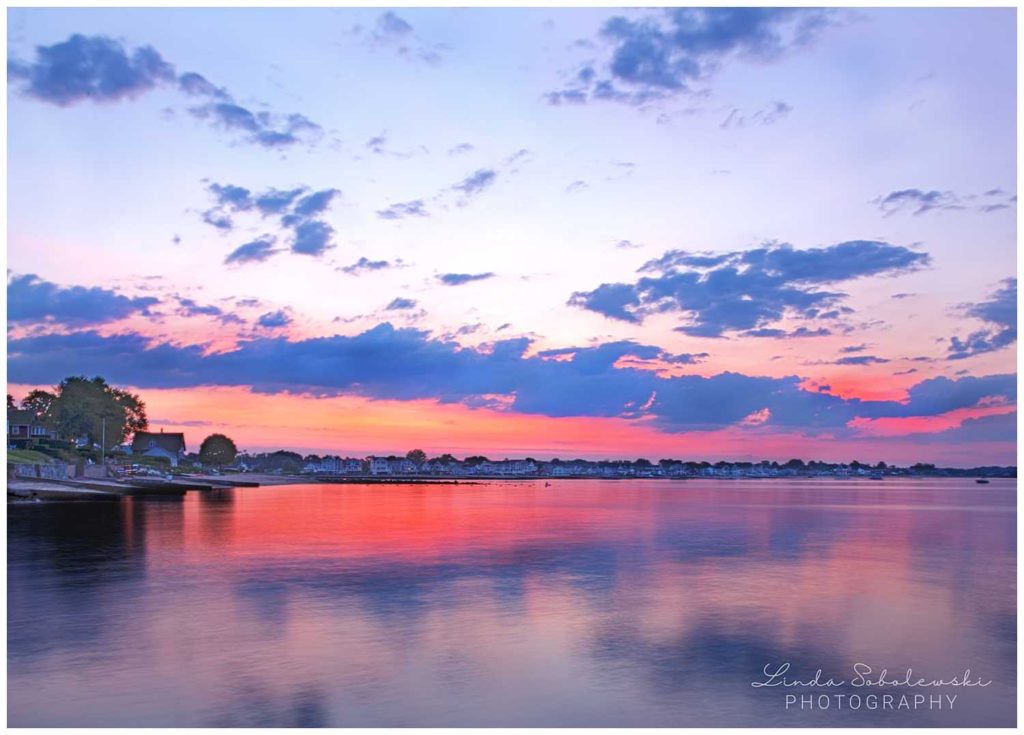 red and blue skies over the water at sunset, westbrook ct photographer