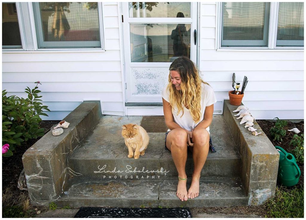 girl and orange cat sitting on a porch, westbrook, ct photographer, personal project