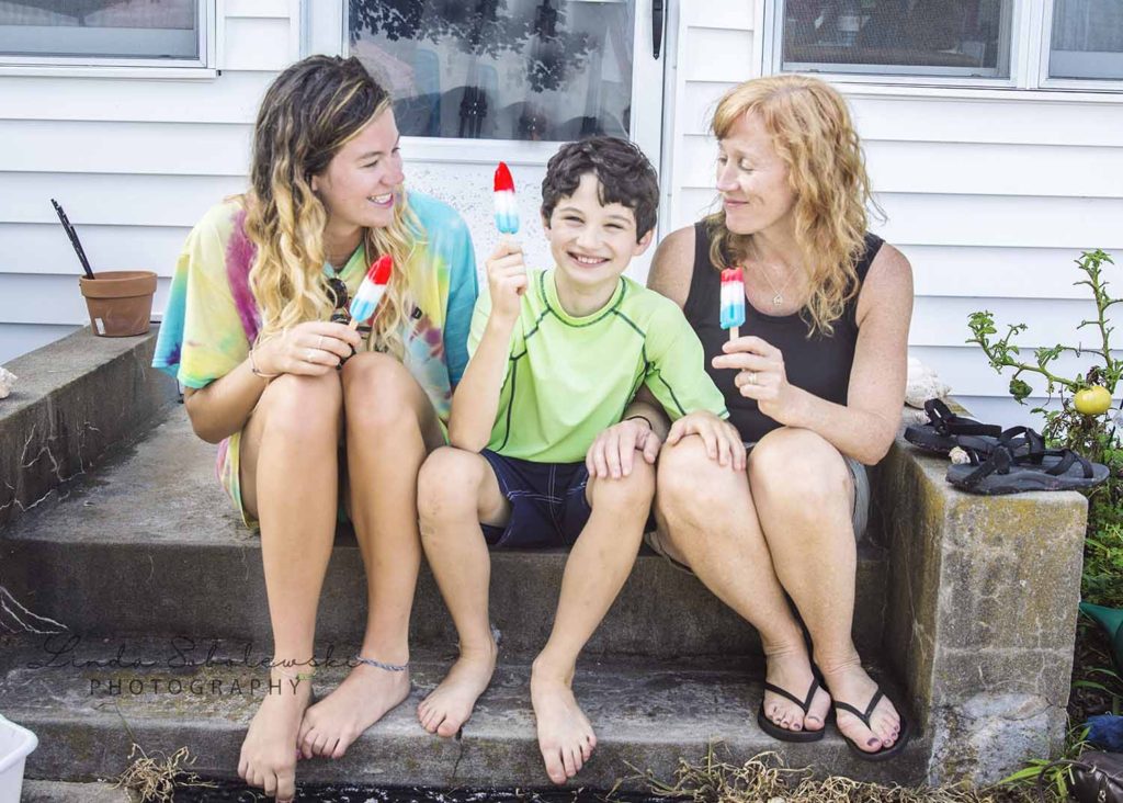 mom, son and aunt sitting on a porch eating popsicles on a summer afternoon, Westbrook photography