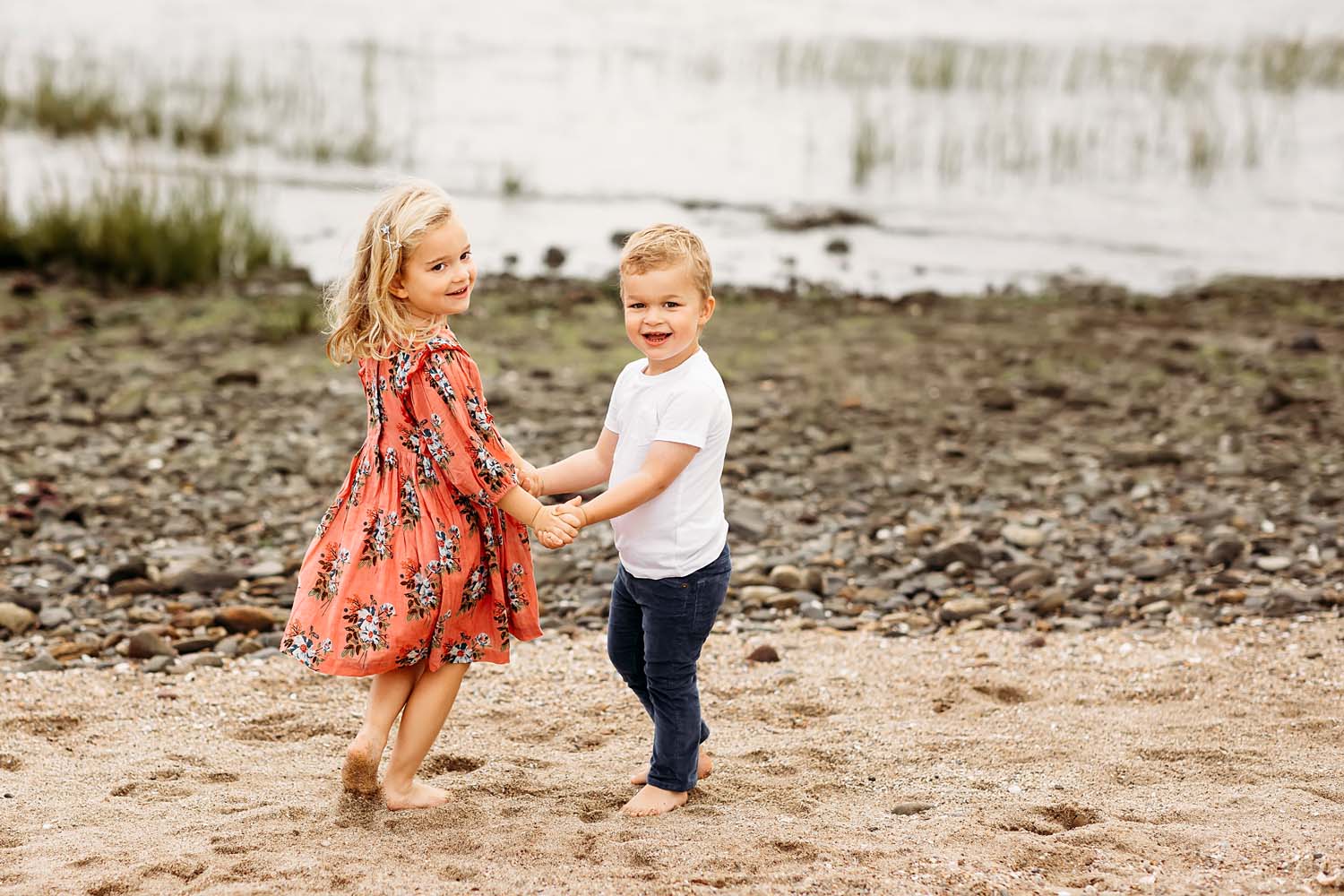 brother and sister playing at the beach, CT shoreline family photographer