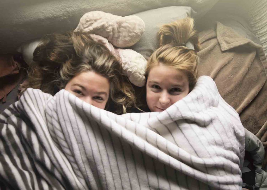 two girls laying under the covers, Westbrook family photographer
