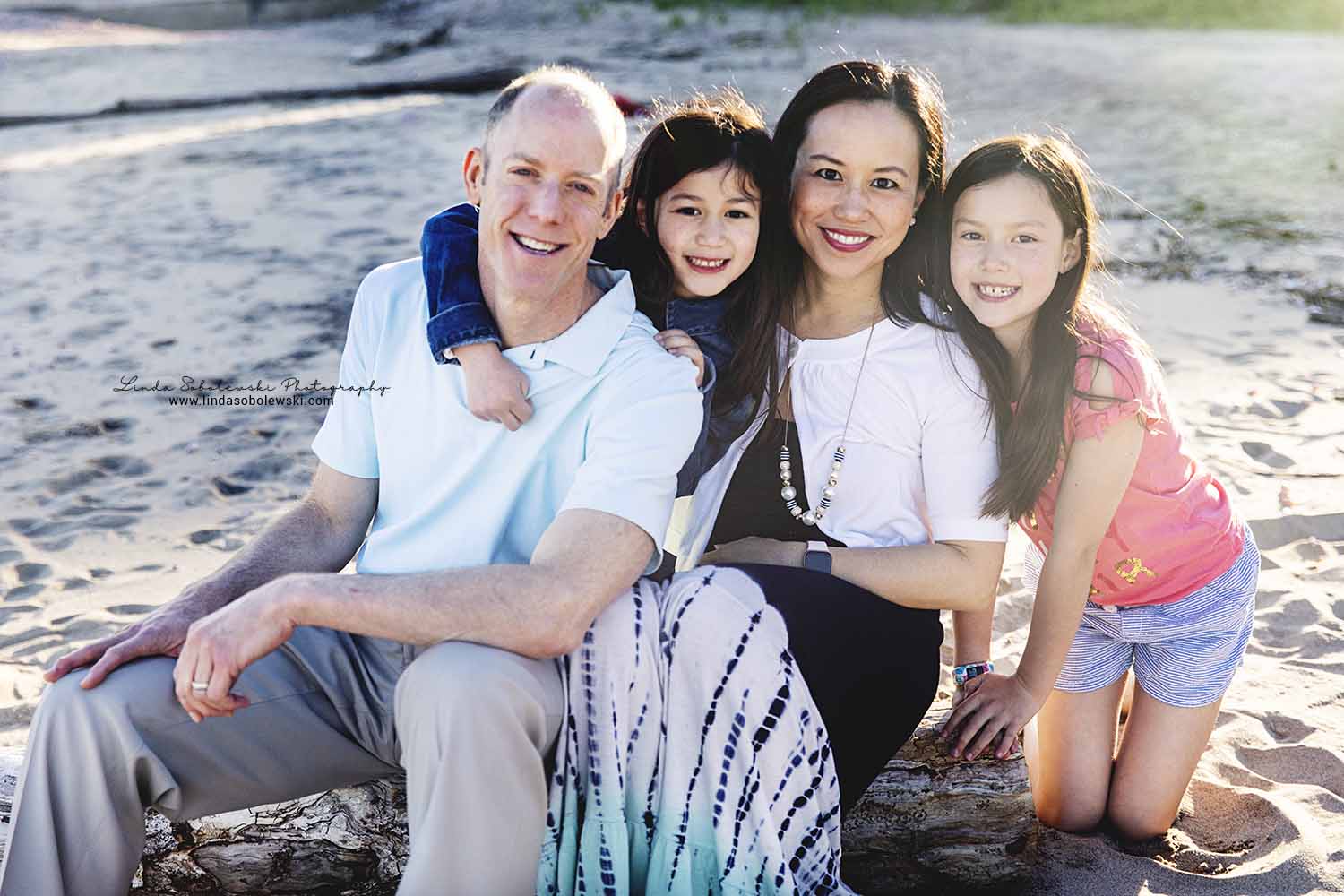 beautiful family of four at the beach for a family session, chapman beach, westbrook ct photography