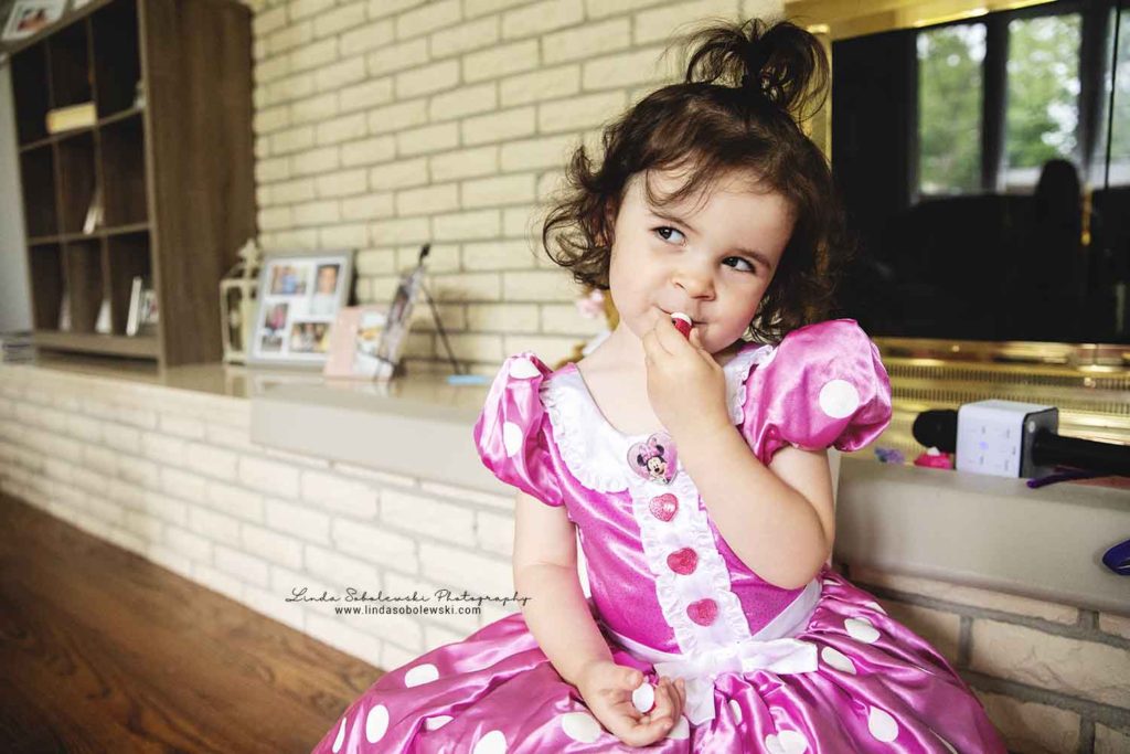 two year old girl playing dress up, branford baby and family photographer