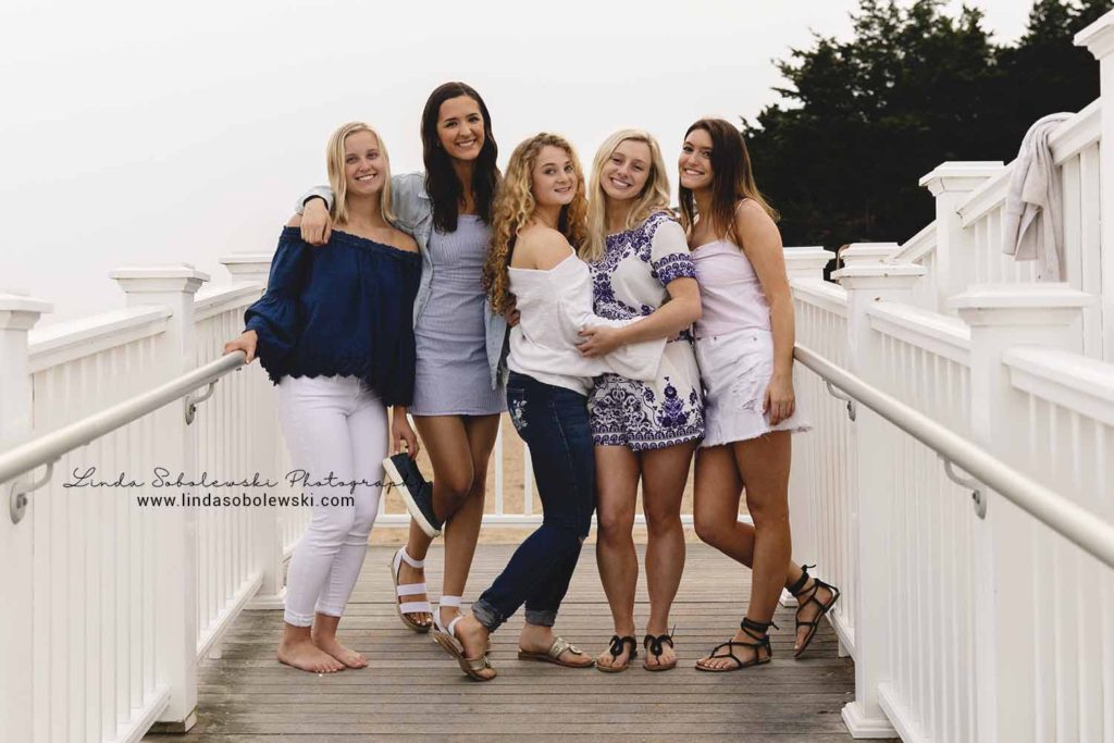 five senior girls posing on the beach, Connecticut senior photographer