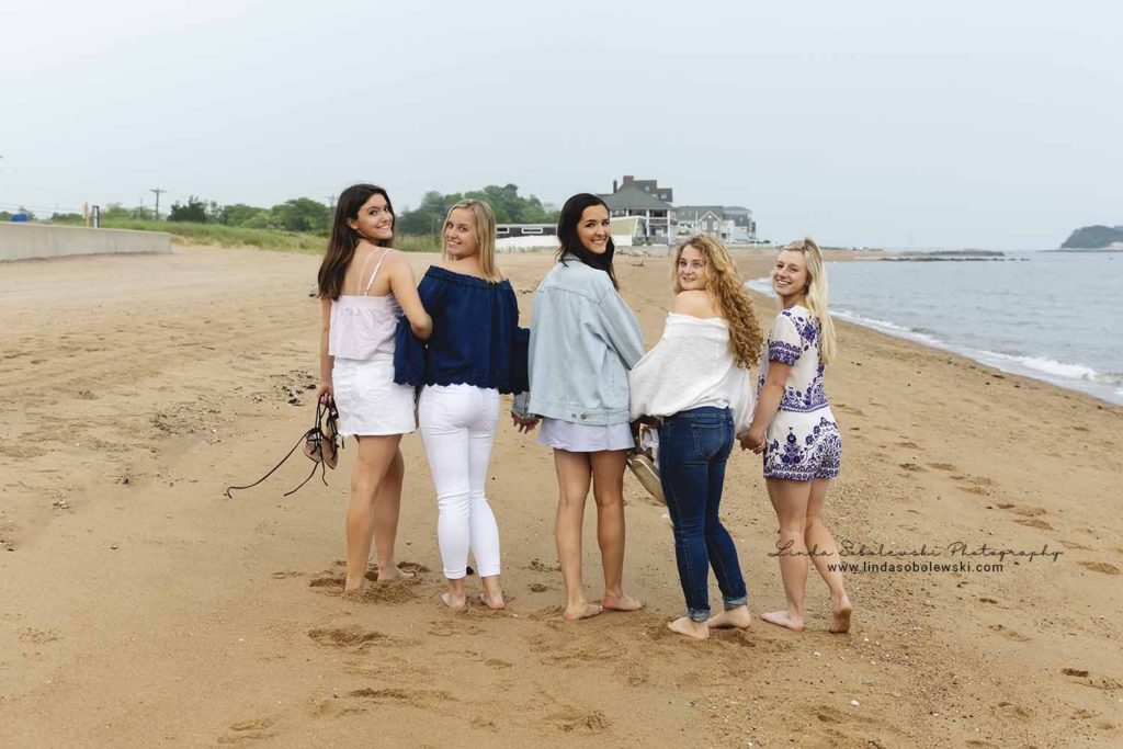 5 girls walking on the beach, Madison surf club, westbrook senior photographer