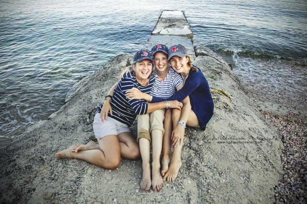 family wearing Red Sox hats at the beach, westbrook ct photographer