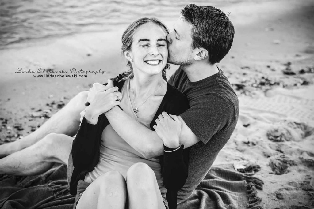black and white image of couple at the beach, westbrook ct family photographer