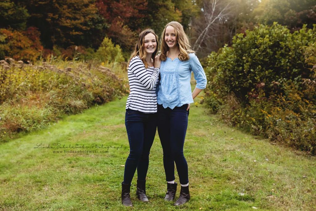 two teenage sisters smiling, Madison, CT family photographer