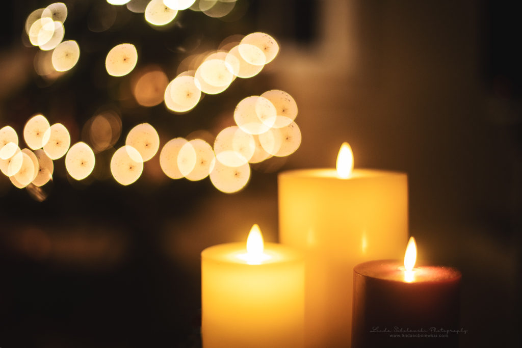 candles with christmas lights in the background, 2019 Project 52, Old Saybrook CT Photographer
