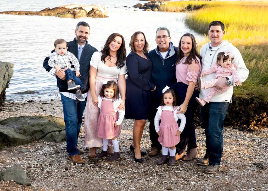 large family posing near the water photo session at chaffinch island. Old Saybrook, CT Photographer