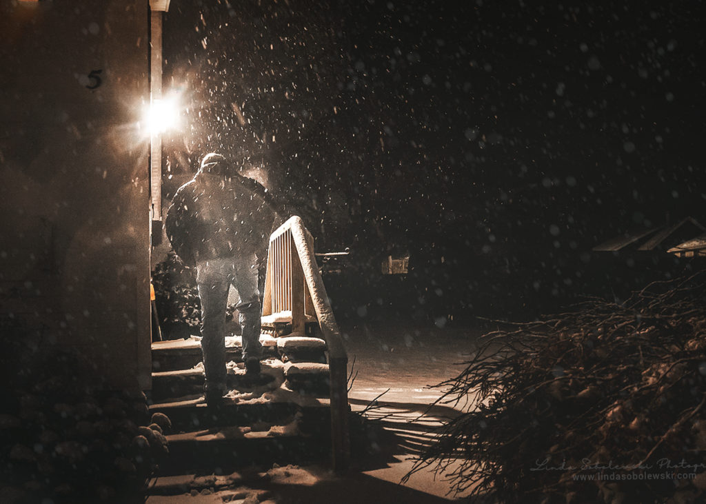 man walking up stairs in the snow, p52 project, lowlight, Linda Sobolewski Photography