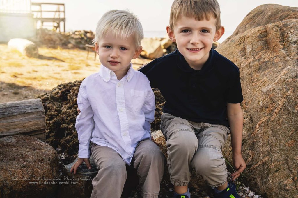 two brothers sitting at the beach, Connecticut Family Photographer