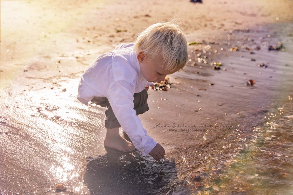 little blonde boy playing at the beach, Old Saybrook Family and Child Photographer