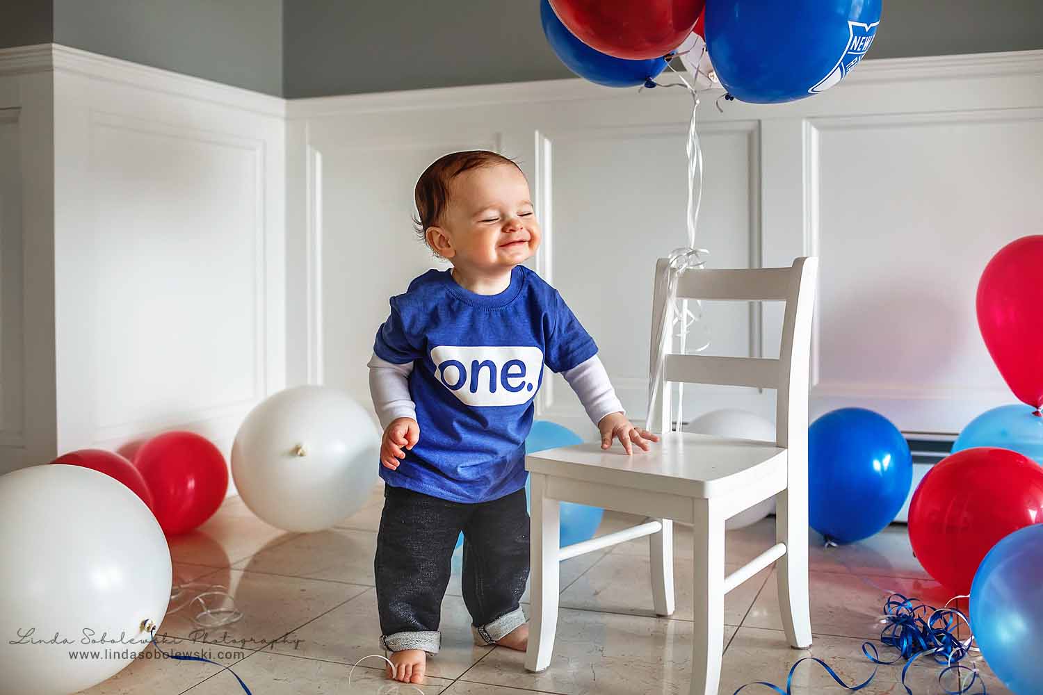 baby boy's first birthday celebration, little boy in blue shirt celebrating his 1st birthday, Branford CT Photographer