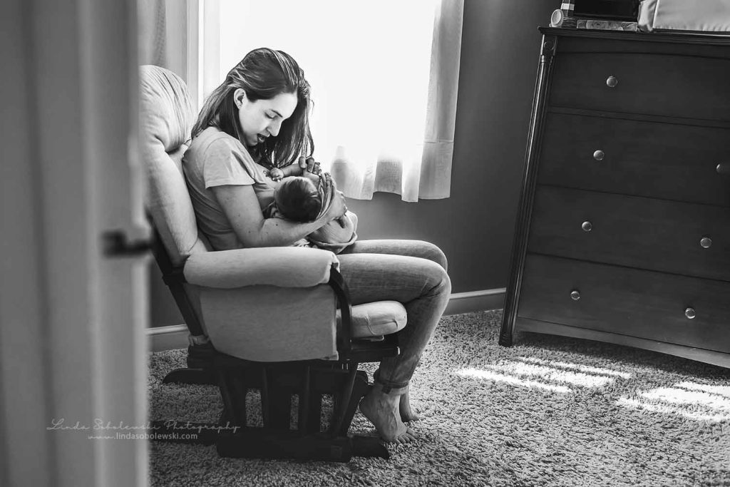 black and white image of mom holding her beautiful baby girl, CT Shoreline Family Photographer