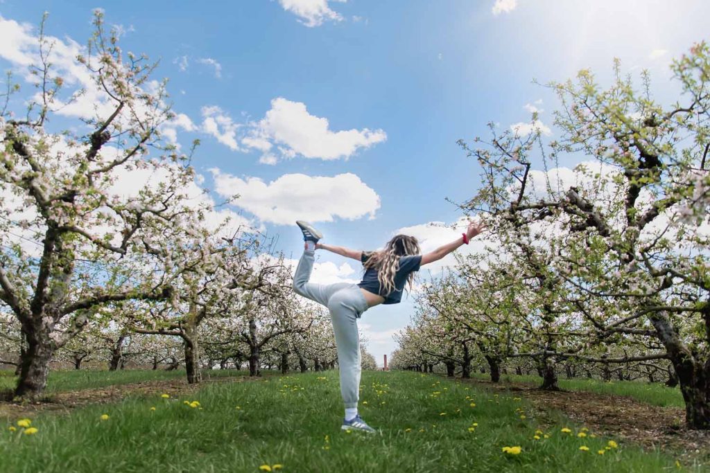 girl doing yoga in an apple orchard, May, 2020 Personal Project for Linda Sobolewski Photography, CT Family Photographer