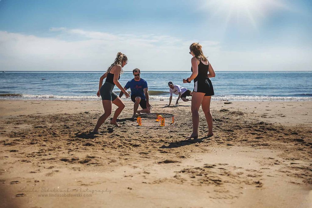 people playing on the beach, May, 2020 Personal Project for Linda Sobolewski Photography, CT Family Photographer