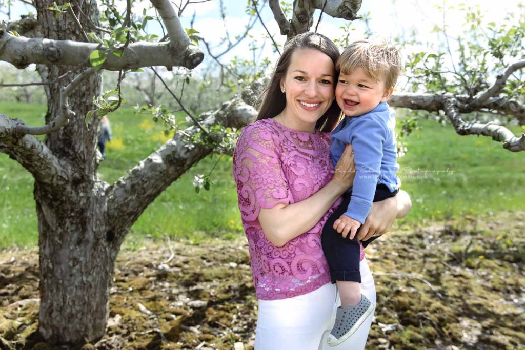 mom holding her little boy under an apple tree, Spring Photo Session, Guilford, CT photographer