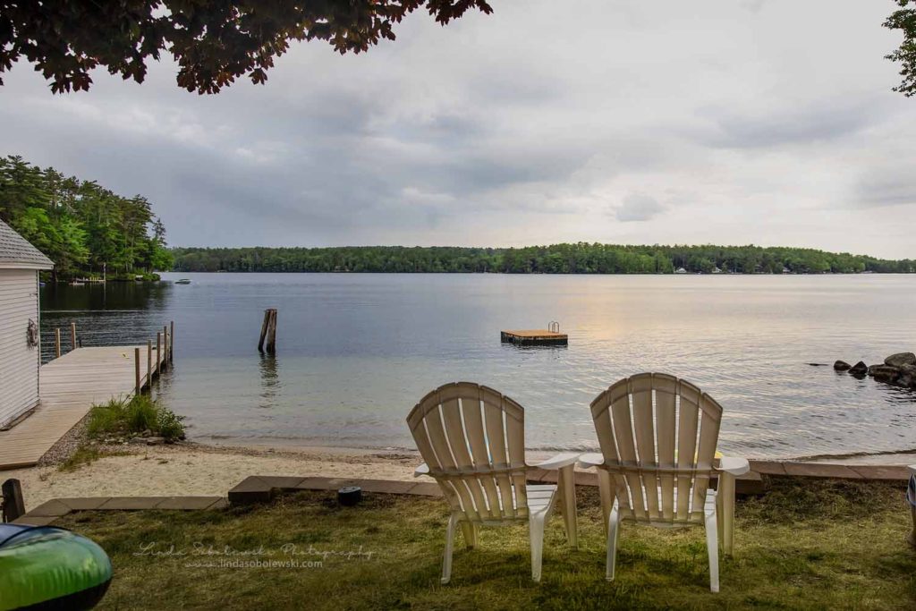 two white Adirondack chairs facing the lake, Weekend Getaway at the lake