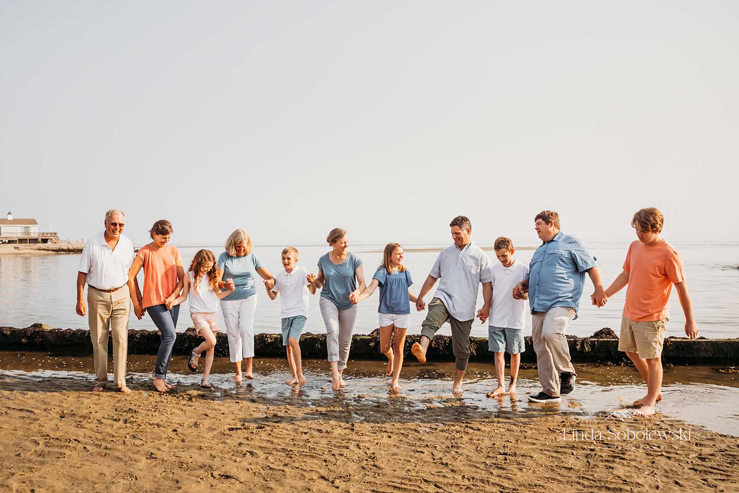 large family playing at the beach, CT Extended Family Photographer