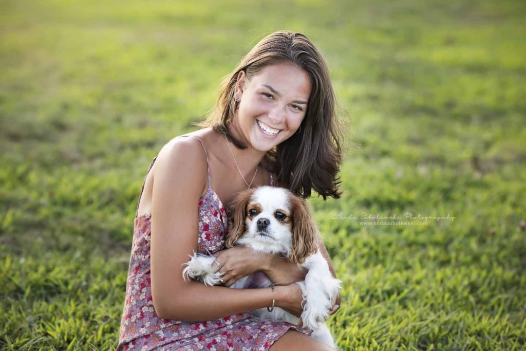 girl holding her dog, high school senior photosession, CT Senior Photographer