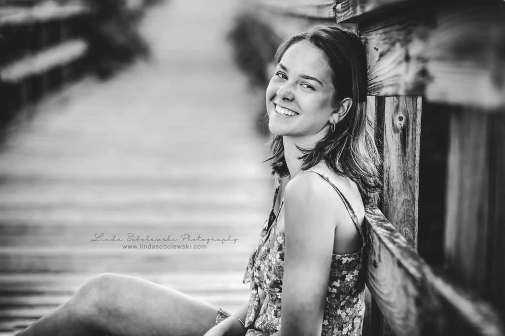 black and white image of girl smiling, CT High School Senior Photosession, Old Saybrook CT family photographer