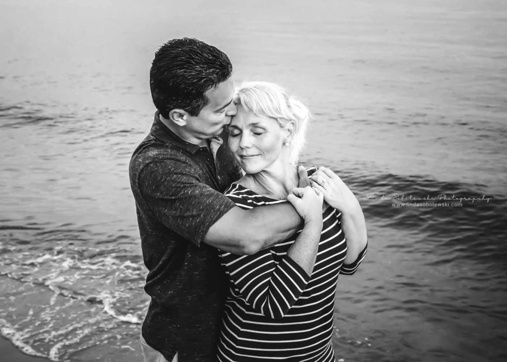 black and white image of couple at the beach, Westbrook and Old Saybrook Family and Lifestyle photographer