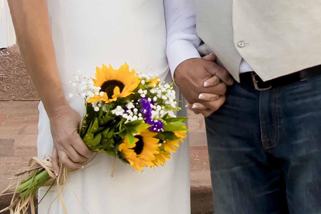 bride holding a bouquet of yellow sunflowers, October 2020 personal project for CT family photographer
