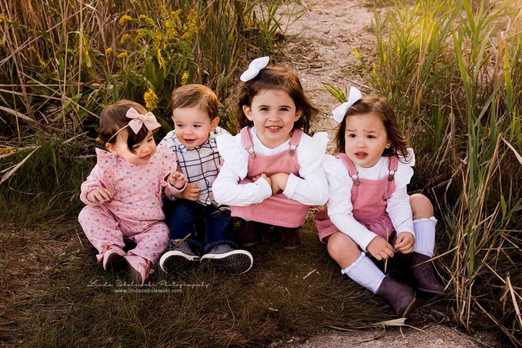 four small children sitting together, CT Family Beach Photo Shoot