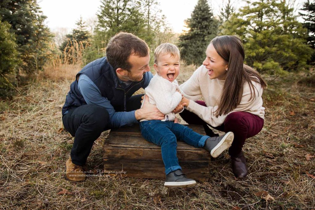 parents tickling their little boy, CT Shoreline Family and Lifestyle photographer