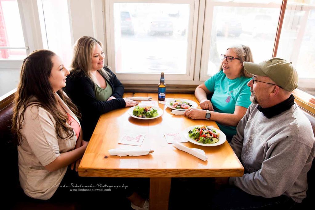 four people sitting at a table eating lunch, Old Saybrook Neighbors Magazine, CT Family Photographer