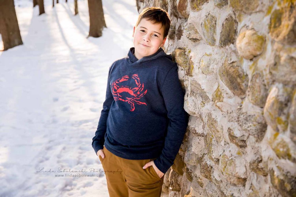 boy with blue sweatshirt on, Family Session in the Snow, CT Shoreline photographer