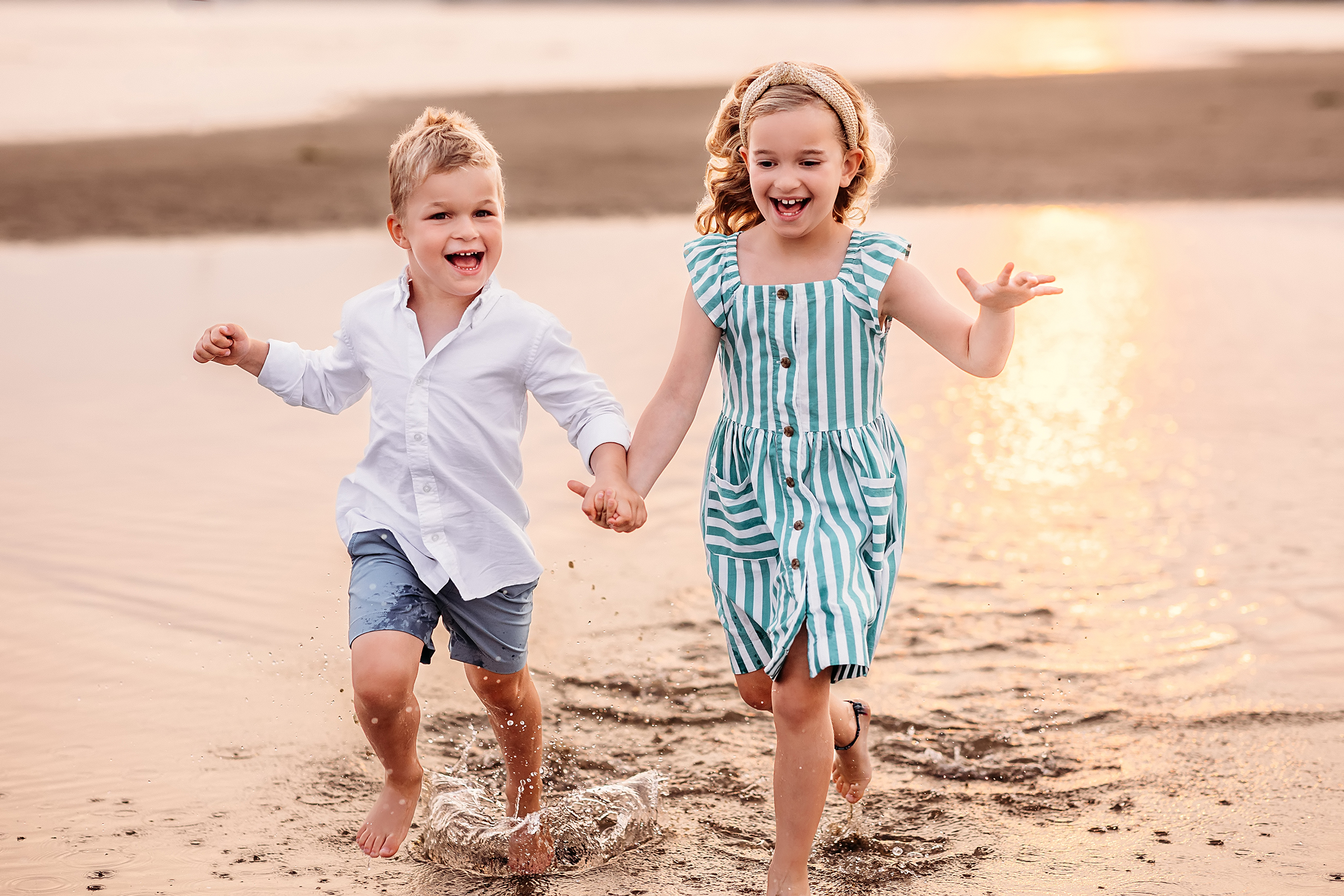 brother and sister walking together at the beach, Summer night petite sessions for 2023 with CT Family photographer (things to do while on vacation in Westbrook and Old Saybrook, CT)