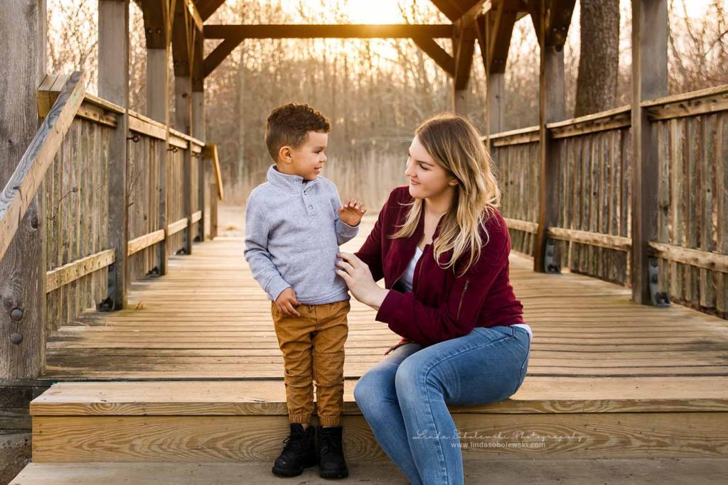 Blonde woman smiling at her little boy,Bauer Park Photo Session, CT Shoreline Family Photographer