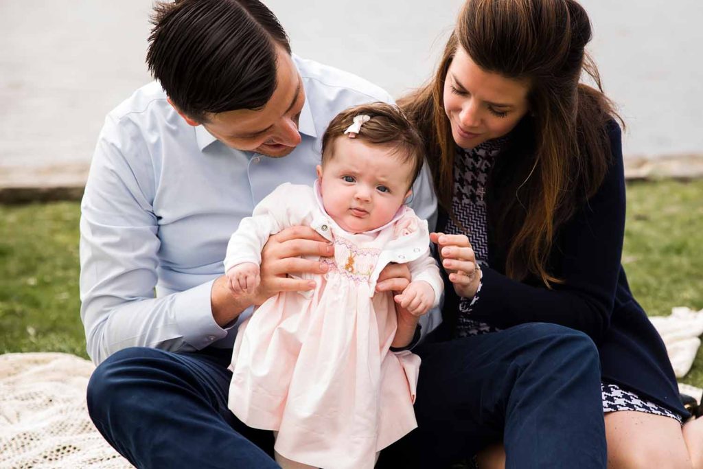 baby in pink dress with her parents, Old Lyme family and newborn photorapher