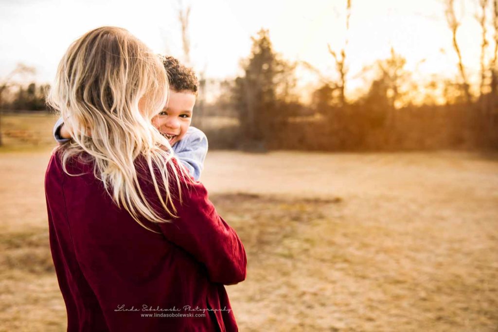 blonde woman holding her little boy, Family session at Bauer Park, CTs best photographer