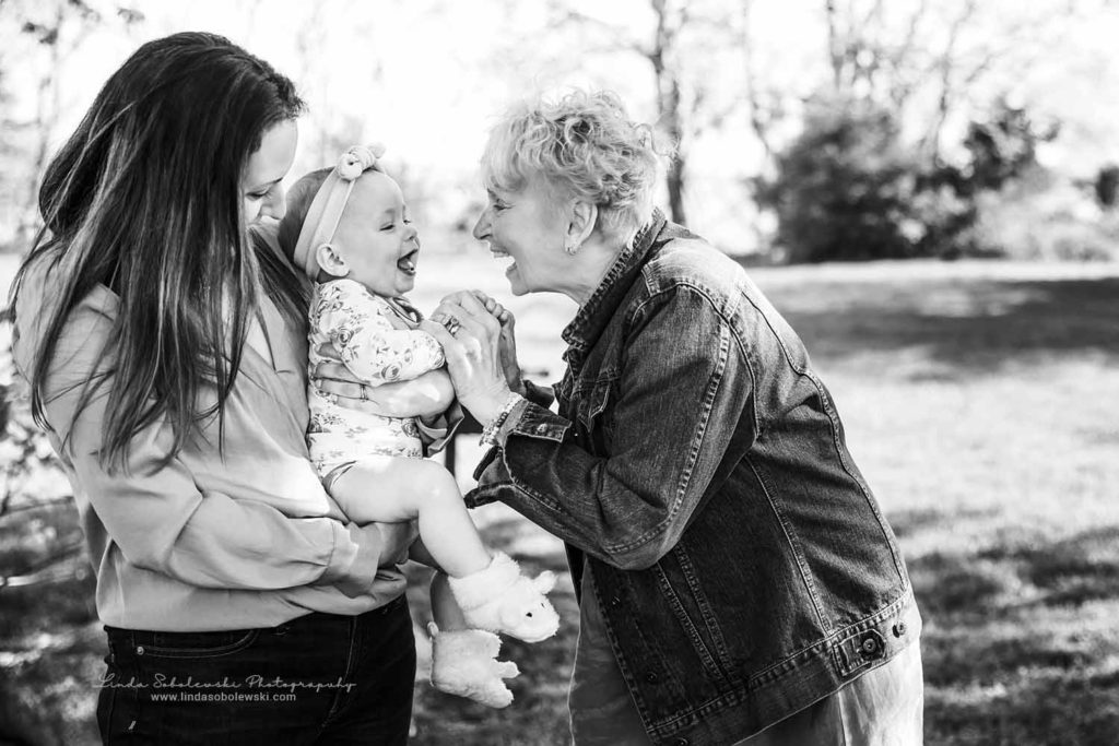 grandmother making her baby grandchild laugh, Family Photography Session in Madison, CT