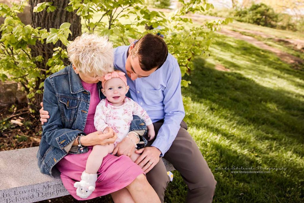 mom and her son playing with their baby grandchild, Spring photo session, Guilford, CT photographer