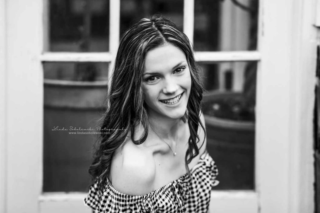 black and white image of a high school senior girl, Senior Portrait Session, CT shoreline photographer