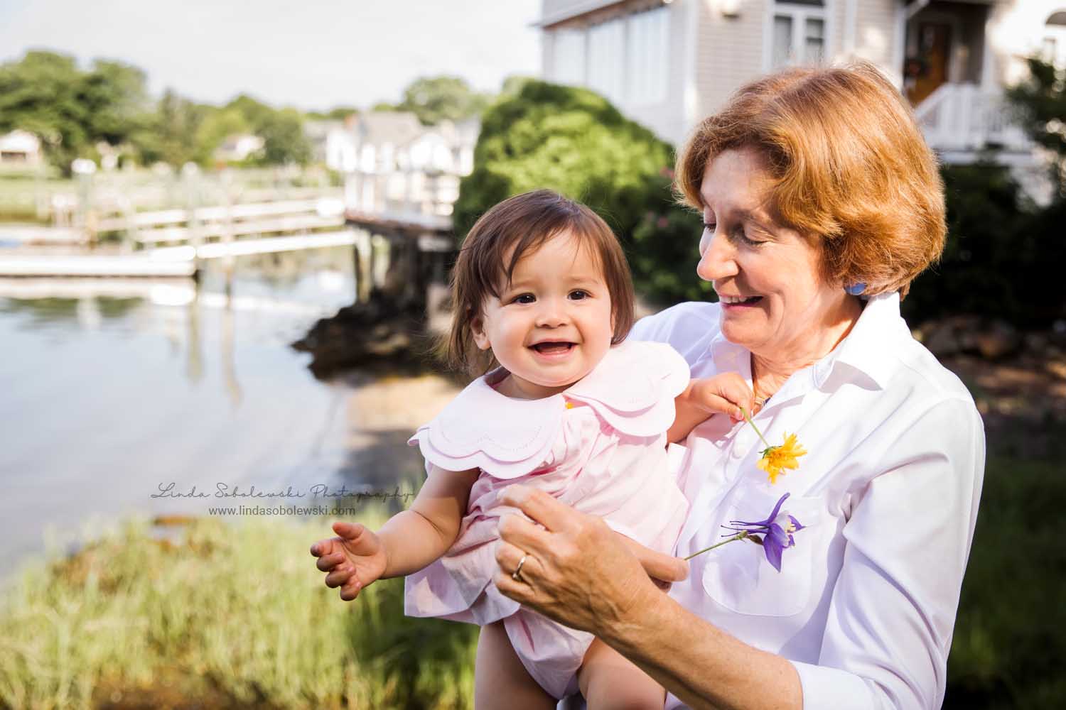 grandmother holding a baby girl, Big Family Photo Shoot, Mystic, Ct photographer