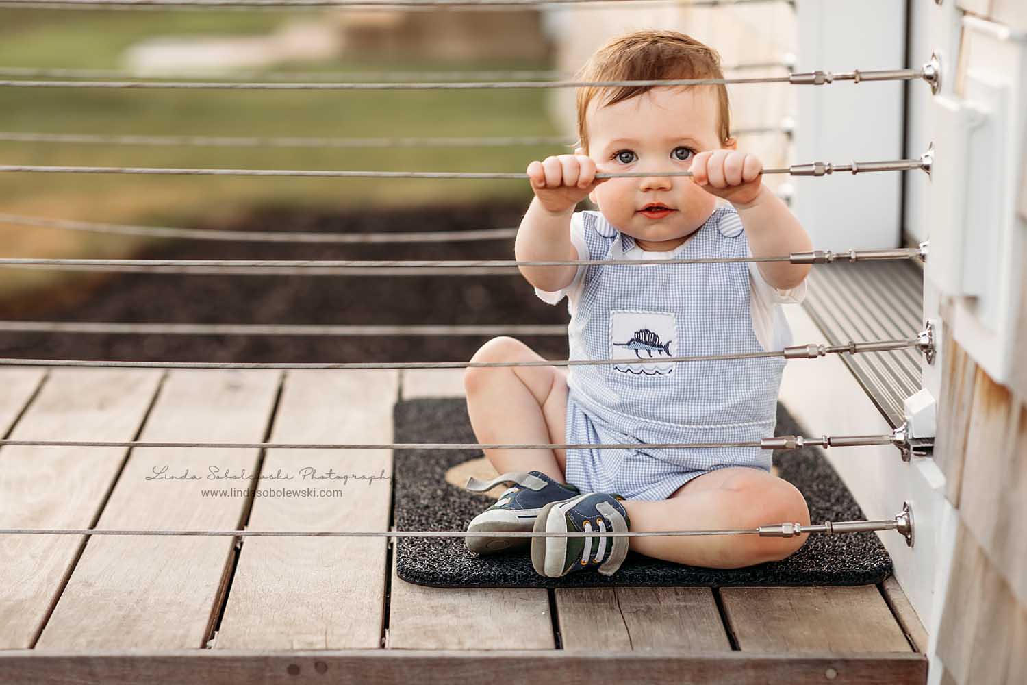 baby sitting on a porch, CT Shoreline photographer