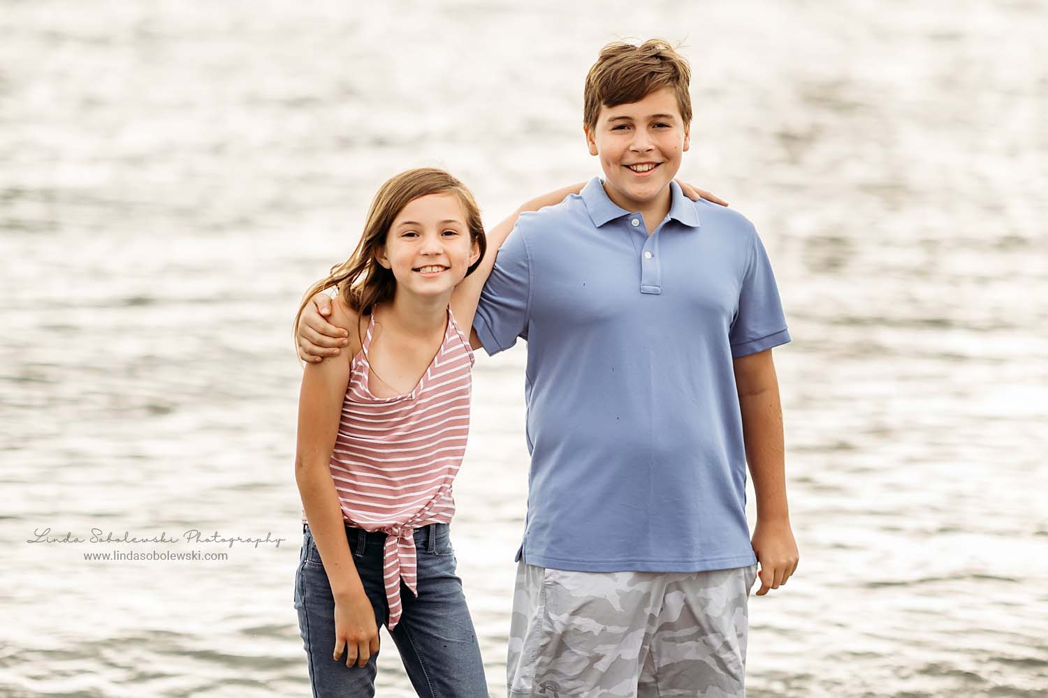 brother and sister playing at the beach, Madison CT photo session