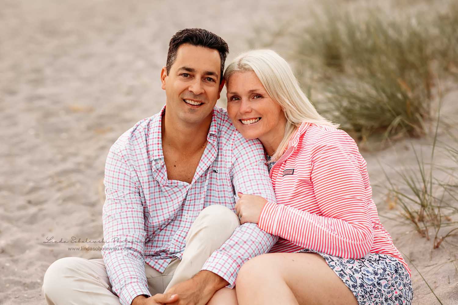 couple sitting together at the beach, CTs best family photographer