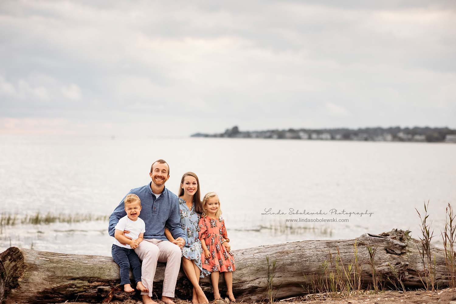 family of four at the beach, Family photos at the Beach, CT shoreline lifestyle photographer