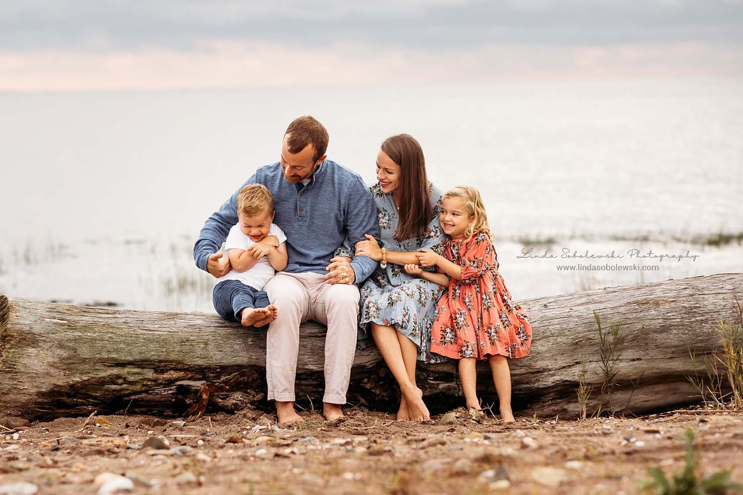 family of four at the beach, Family photos at the Beach, CT shoreline lifestyle photographer