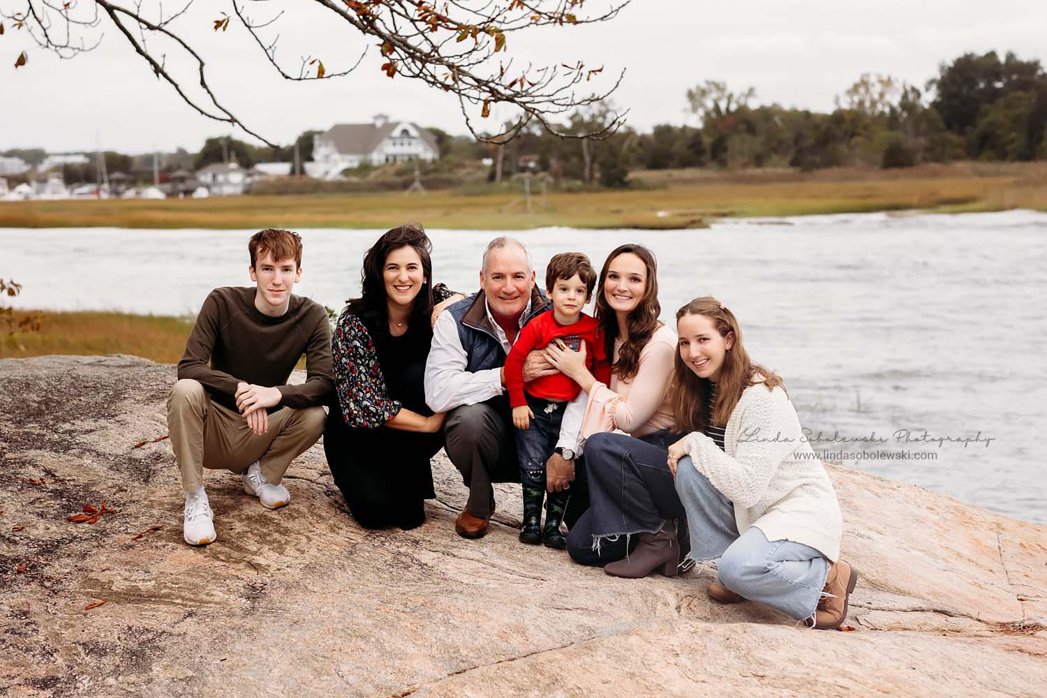 family sitting on the rocks, CT Family photographer