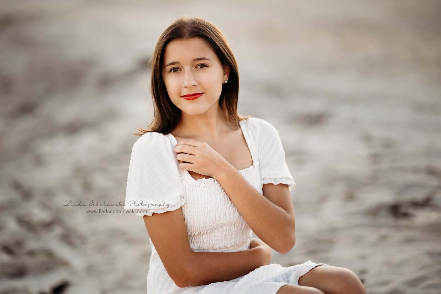 girl with white dress at the beach in Old Lyme, CT Senior photographer
